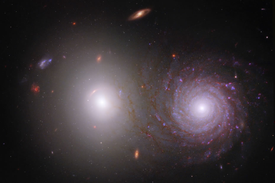 object vv191 - Researchers traced light that was emitted by the bright white elliptical galaxy on the left through the spiral galaxy at right. As a result, they were able to identify the effects of interstellar dust in the spiral galaxy. Webb’s near-infrared data also shows us the galaxy’s longer, extremely dusty spiral arms in far more detail, giving them an appearance of overlapping with the central bulge of the bright white elliptical galaxy on the left, though the pair are not interacting.
